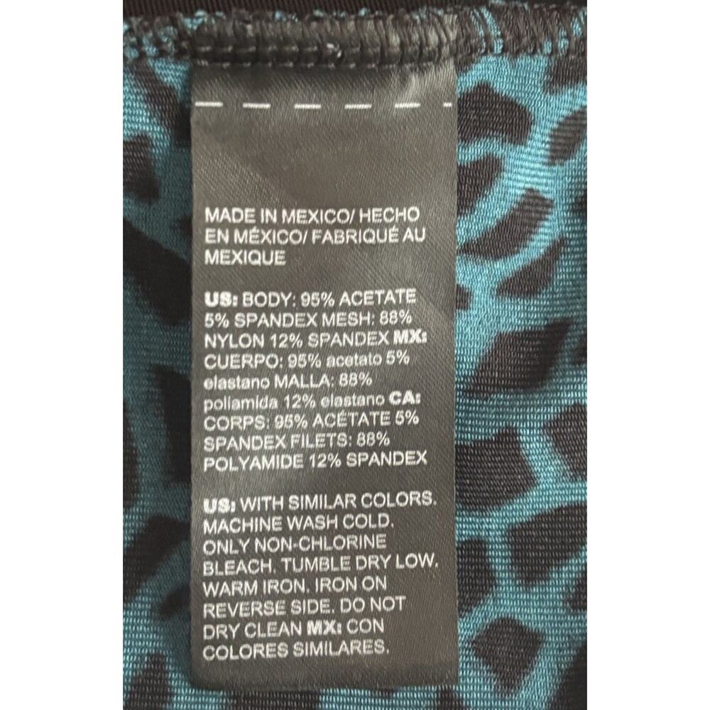 Chico's Travelers Top Size 0, Small Slinky Cut Out Blue Black - Picture 6 of 6